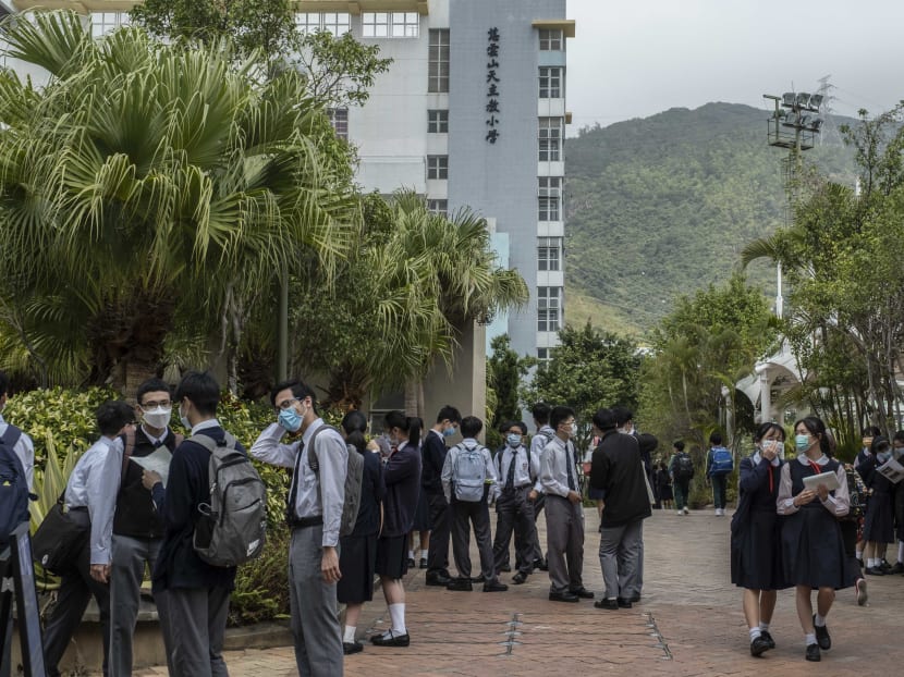 Students leave school in Hong Kong on Feb 24, 2021. The Hong Kong government has launched a vast campaign to indoctrinate the next generation and it is using history as a potentially powerful tool to inculcate obedience and patriotism. Students leave school in Hong Kong on Feb 24, 2021. The Hong Kong government has launched a vast campaign to indoctrinate the next generation and it is using history as a potentially powerful tool to inculcate obedience and patriotism.