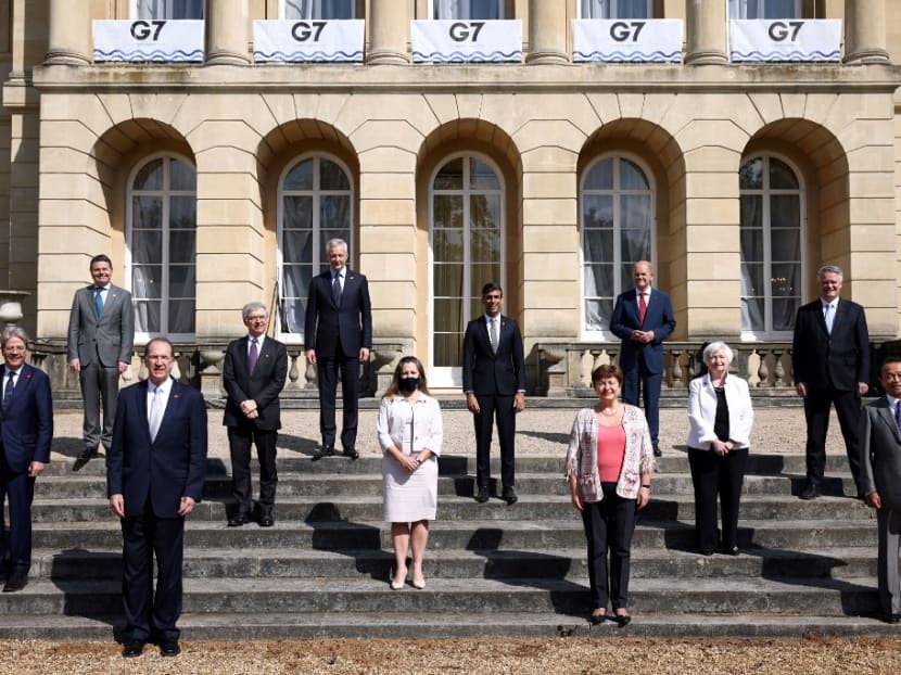 Finance ministers from wealthy Group of Seven (G7) nations pose for a photo on the second day of the G7 Finance Ministers Meeting, at Lancaster House in London on June 5, 2021.