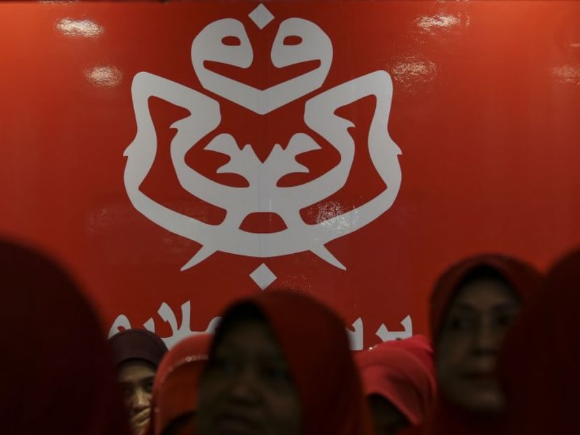 Umno logo at the Putra World Trade Centre (PWTC) during the Umno general assembly last year. Malaysian Prime Minister Mahathir Mohamad says Umno and PAS are now allies.