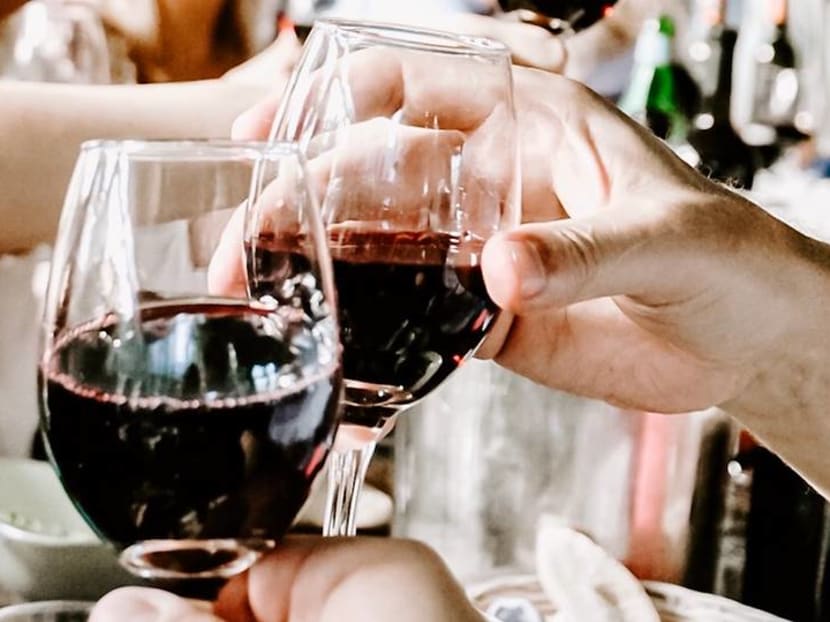 Commentary: Did you look forward to that glass of wine a bit too much? Commentary: Did you look forward to that glass of wine a bit too much?