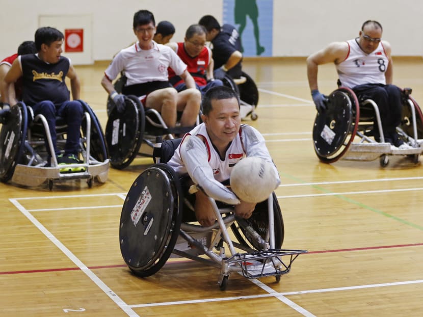 Singapore wheelchair rugby athletes at home in rough sport