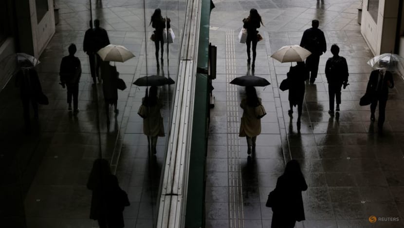 Japan says economy picking up moderately, while govt staying vigilant to risks