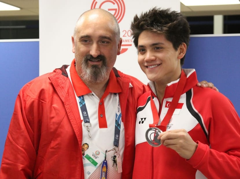Sergio Lopez with Joseph Schooling at last year's Commonwealth Games. TODAY FILE PHOTO