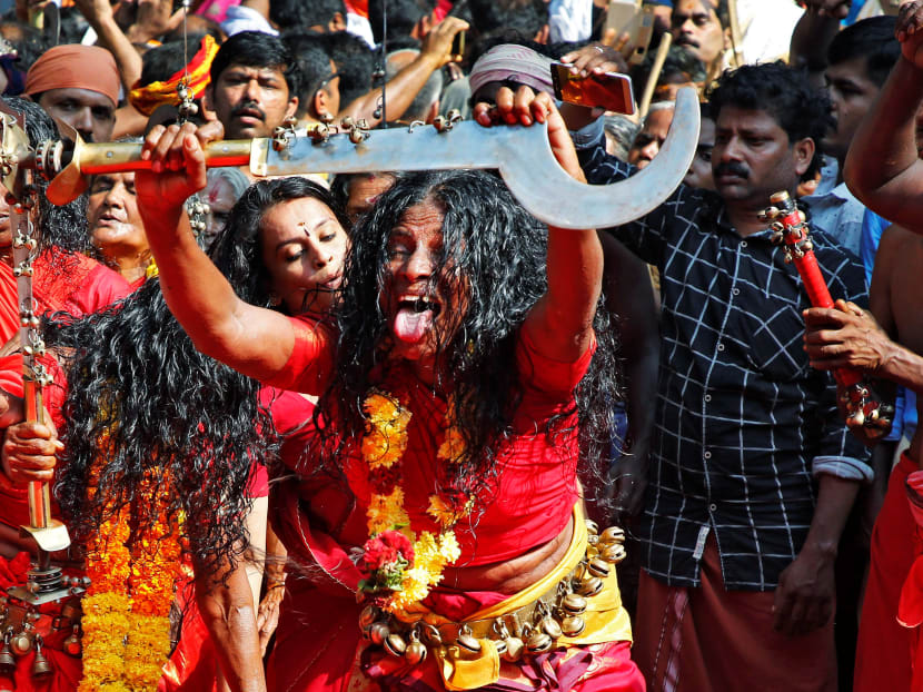 Photo of the day: A woman holds a sword as she dances during the annual Kodungalloor Bharani festival which honours the Hindu Goddess Bhadrakali at a temple in Kodungalloor town, in the southern state of Kerala, India on Sunday, April 7, 2019.