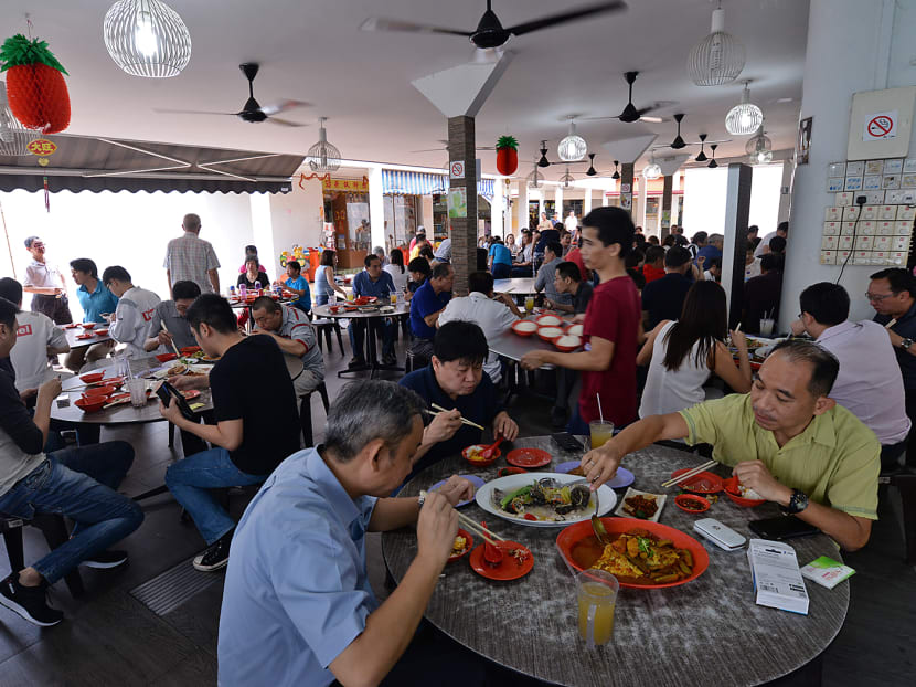 Mr Ong Cheng Kee, the owner of Zai Shun Curry Fish Head, said he served about 50 more customers during lunchtime a day after the Bib Gourmand announcement on June 23, 2017, a “10%” increase from a typical day during this period. Photo: Robin Choo/TODAY