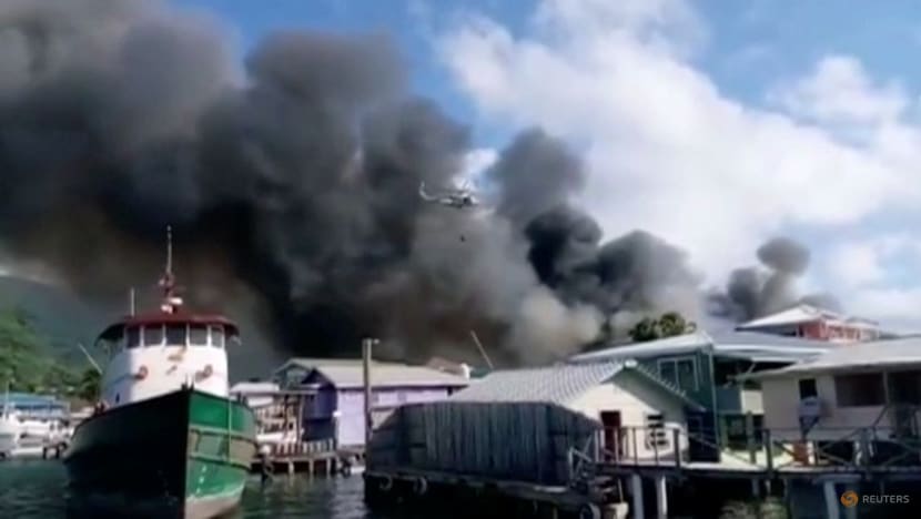Fire devastates Honduras' Caribbean resort island of Guanaja Fire devastates Honduras' Caribbean resort island of Guanaja