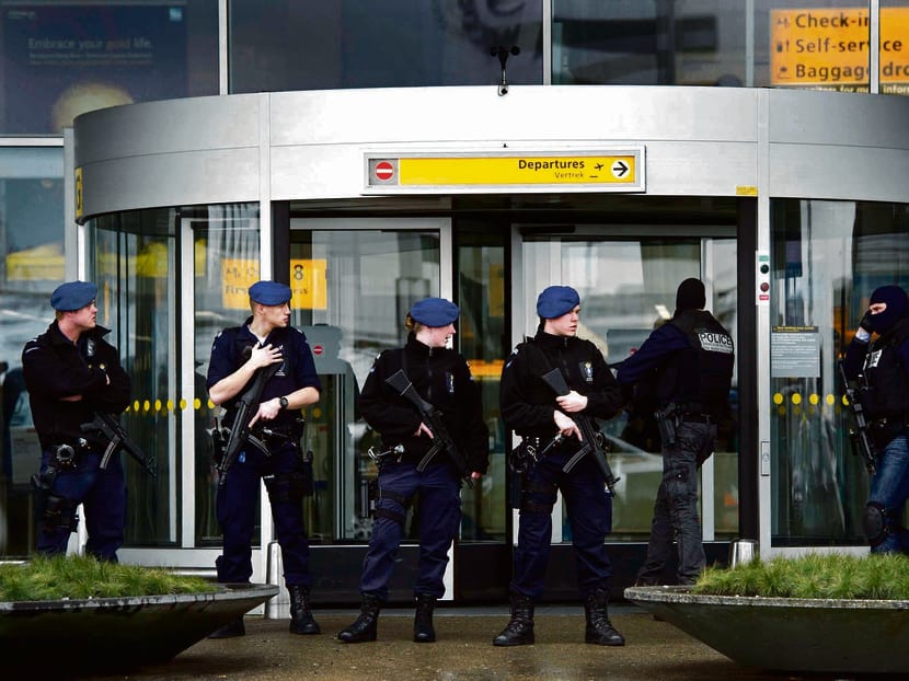 Airport police blocking the entrance at Schiphol Airport, near Amsterdam. AP file photo