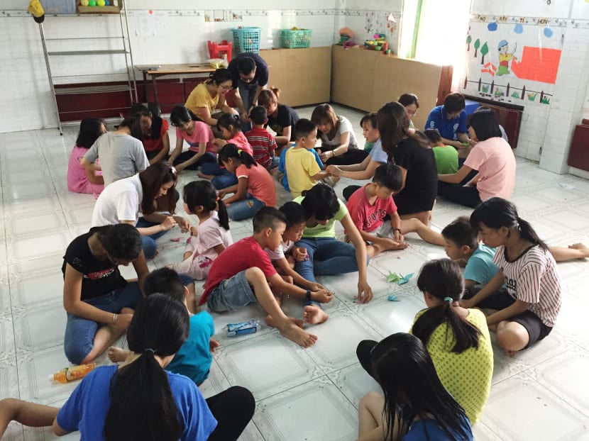 Friends from Singapore visiting and conducting activities with the children at the Thi An Orphanage. Photo Credit: Poh Wei Ye/Thi An Orphanage