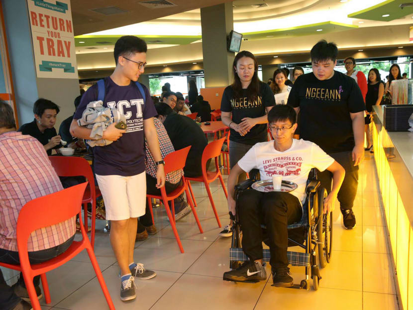 Geoffrey Cho, a student from Ngee Ann Polytechnic, taking part in the Wheelchair Challenge during the launch of "Inclusivity &  Me" campaign,on 27 June 2017. Photo: Wee Teck Hian/TODAY