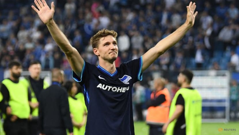 Hertha Berlin win playoff to deny Hamburg promotion to Bundesliga Hertha Berlin win playoff to deny Hamburg promotion to Bundesliga
