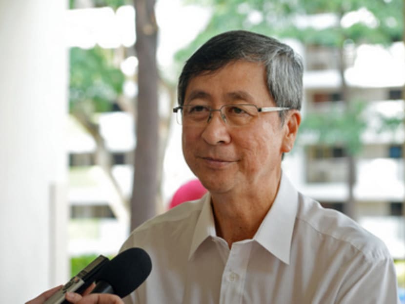 Mr Lim Boon Heng speaking to the media after a meeting with Kaki Bukit activists. He has extolled the hard work that PAP’s branch chairmen have put in. Photo: Robin Choo