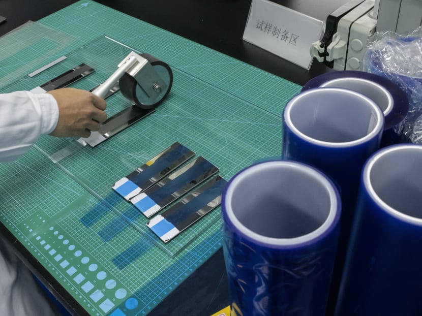Testing adhesives at a lab for Tsinghon, a start-up making high-end films adhesives for chip products, in Shenzhen, China, Dec 17, 2020. Beijing’s drive to free itself from reliance on imported semiconductors has lifted startups and big firms alike. Testing adhesives at a lab for Tsinghon, a start-up making high-end films adhesives for chip products, in Shenzhen, China, Dec 17, 2020. Beijing’s drive to free itself from reliance on imported semiconductors has lifted startups and big firms alike.