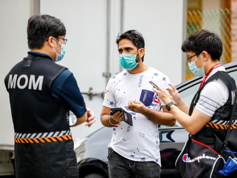 Ministry of Manpower officers conducting enforcement operations in Little India on April 12, 2020.