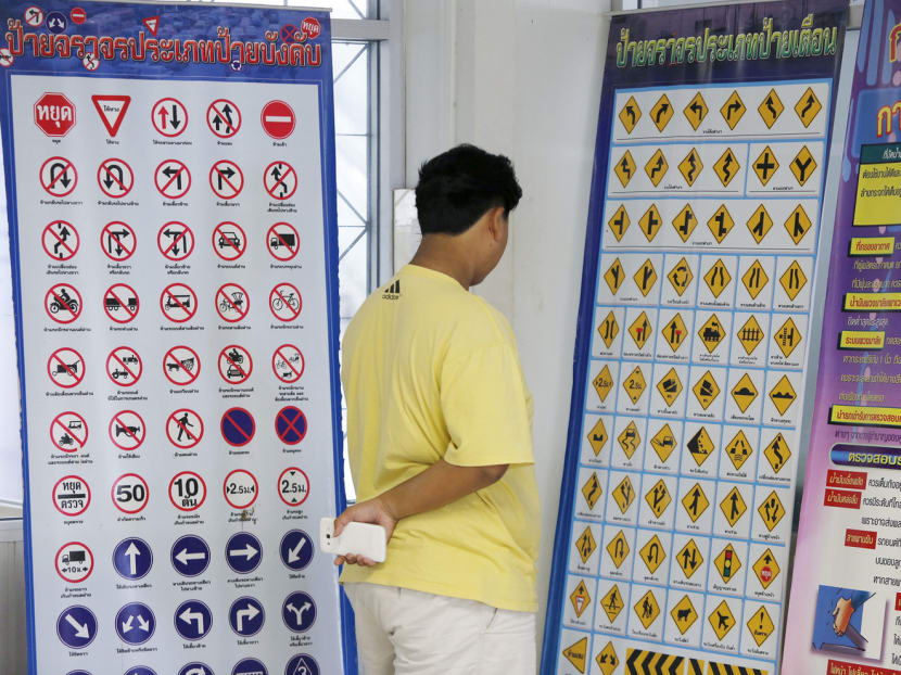 To qualify for a driving licence, an applicant has to pass a series of tests, such as knowledge of traffic rules and the ability to navigate in traffic. Photo: Bangkok Post