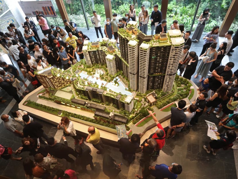 Visitors throng the sales showroom of The Reserve Residences condominium development on May 21, 2023. 