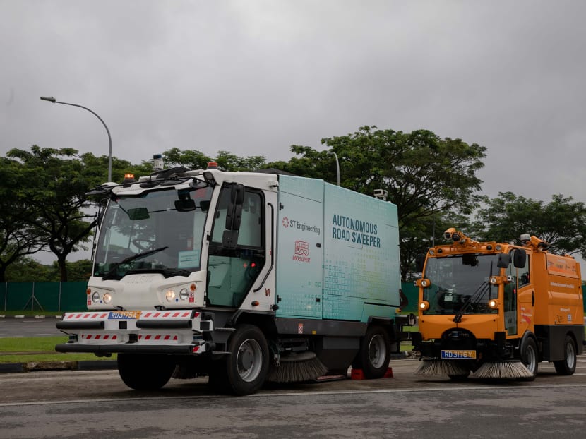 The Autonomous Environmental Service Vehicles by ST Engineering (left) and Nanyang Technological University at NTU’s Centre of Excellence for Testing & Research of Autonomous Vehicles on Jan 13, 2021.