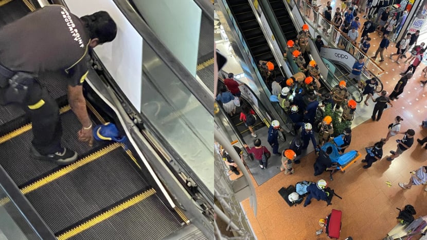boy foot stuck escalator jurong point rubber shoe