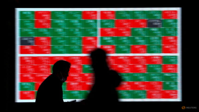 Asian shares sink on banking jitters, US economic concerns
