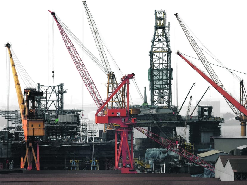 Oil rigs are under construction at the Jurong Shipyard of Sembcorp Marine Ltd in Singapore. Photo: Bloomberg
