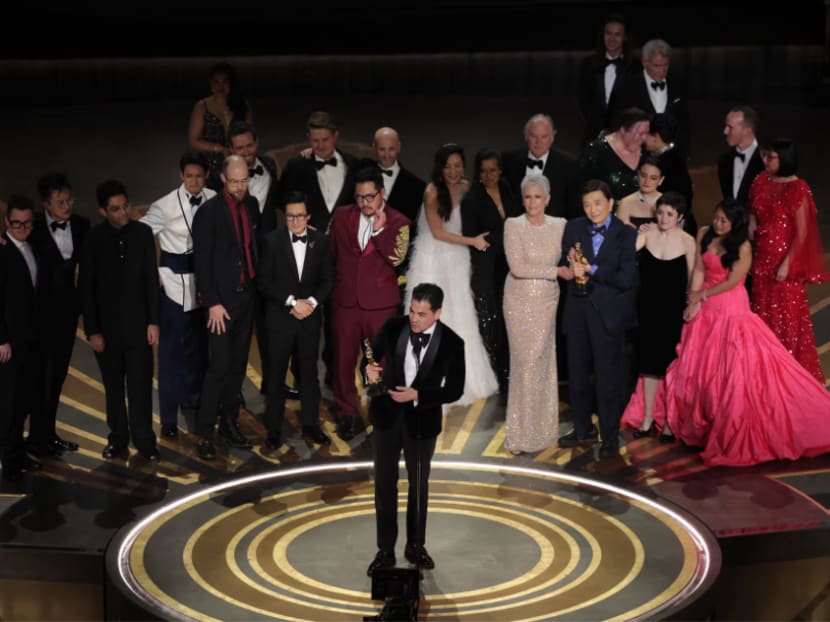 Daniel Kwan, Daniel Scheinert and Jonathan Wang win the Oscar for Best Picture for "Everything Everywhere All at Once" during the Oscars show at the 95th Academy Awards in Hollywood, Los Angeles, California, US, March 12, 2023.