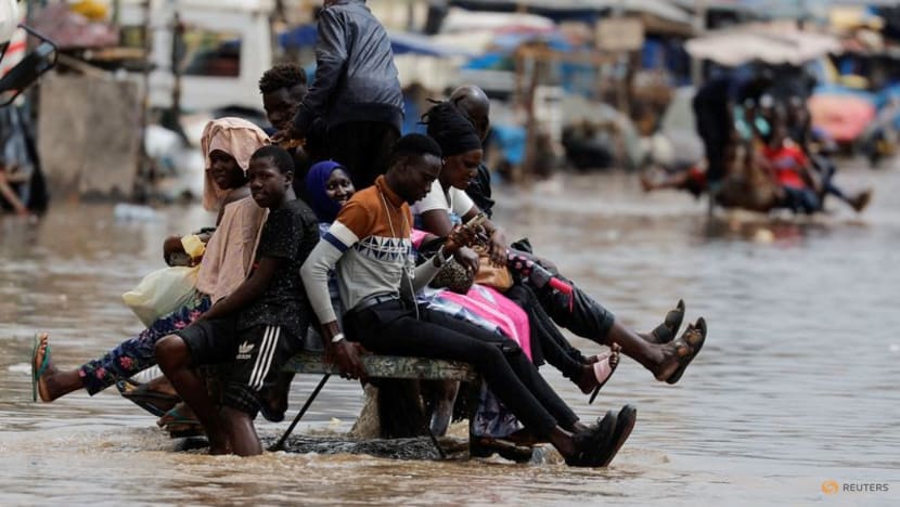 Senegal capital wades through floodwater after heavy rain Senegal capital wades through floodwater after heavy rain