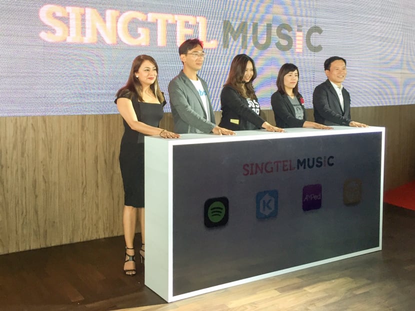 Singtel launches new data-free music plan with Spotify, KKBOX, MeRadio and AMPed. Photo: Hon Jing Yi/TODAY