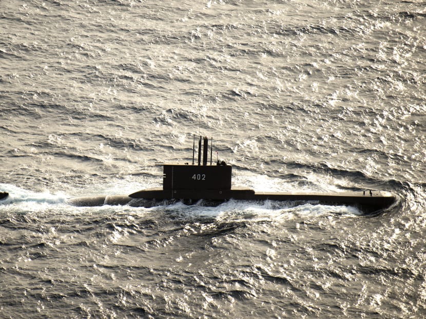 Search for missing Indonesian submarine finds oil spill Search for missing Indonesian submarine finds oil spill