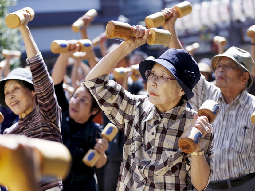 Elderly people exercising with wooden dumbbells in Japan. By 2050, South Korea, Singapore, Thailand and China 

are expected to have a higher share of people aged over 65 than developed countries such as Canada, France, 

the United Kingdom, Australia and the United States, although Japan will still be top of the pile. Photo: Reuters