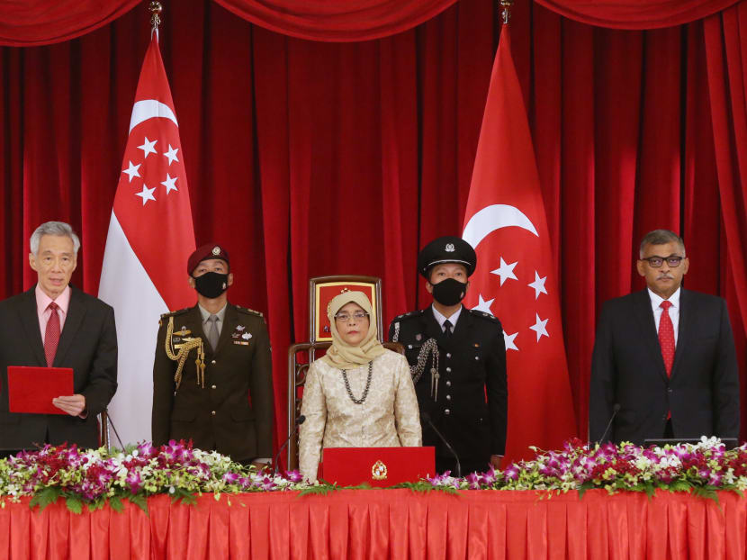 Front row, left to right: Prime Minister Lee Hsien Loong, President Halimah Yacob and Chief Justice Sundaresh Menon at the swearing-in ceremony of the new Cabinet on July 27, 2020.