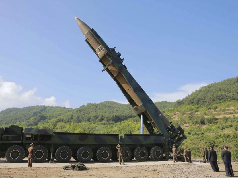 A file photo released by North Korea on July 4 showing the Hwasong-14 intercontinental ballistic missile readying for launch. The launch has led US intelligence to reassess North Korea’s nuclear capabilities. Photo: AP