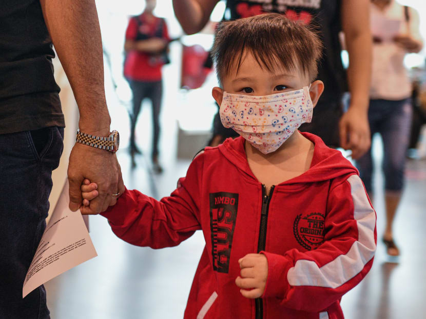 A child wears a face masks upon arrival at the Kuala Lumpur International Airport 2 in Sepang on Jan 29, 2020.