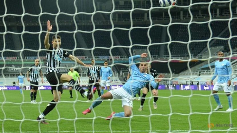 Football: Torres hat-trick as record-breaking Man City beat Newcastle
