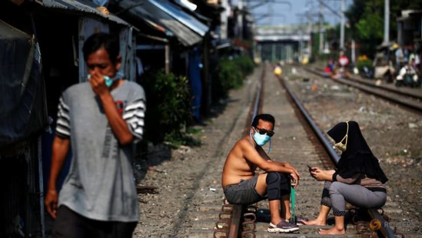More than 2,200 Indonesians who died may have had COVID-19 symptoms, data shows More than 2,200 Indonesians who died may have had COVID-19 symptoms, data shows