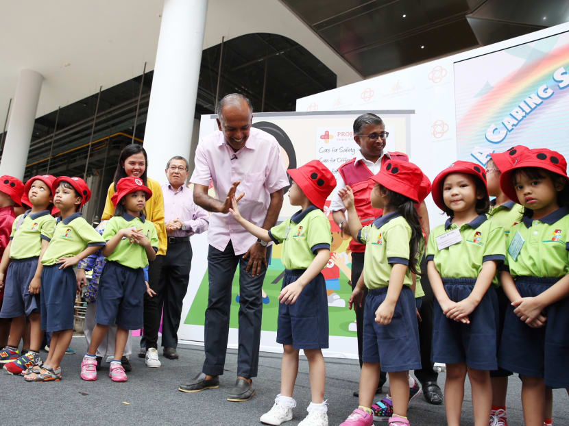 Mr Shanmugam, seen here at the Red Cross Junior Club event on Friday (April 20), says that every organisation and every community in Singapore must come together to help fight inequality.