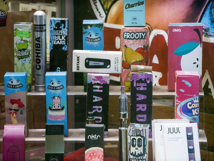 Flavoured e-cigarette products at a store in New York. Mr Amrin said that the e-cigarette industry is increasingly dominated by the tobacco industry. For example, tobacco giant Altria is now a big shareholder of Juul, a major manufacturer of e-cigarettes in the US.