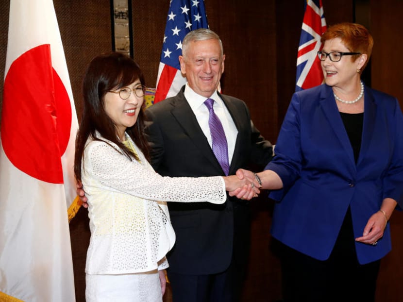 Japan's Defence Minister Tomomi Inada, U.S. Secretary of Defense James Mattis and Australia's Defence Minister Marise Payne pose before a trilateral meeting on the sidelines of the 16th IISS Shangri-La Dialogue in Singapore. Photo: Reuters