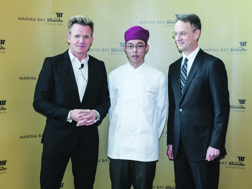 Koh Han Jie (center), from ITE College West, winner of the Search for Bread Street Kitchen Internship, with Gordon Ramsay and George Tanasijevich, president and chief executive officer (CEO) of Marina Bay Sands (MBS). Photo: Jason Ho.