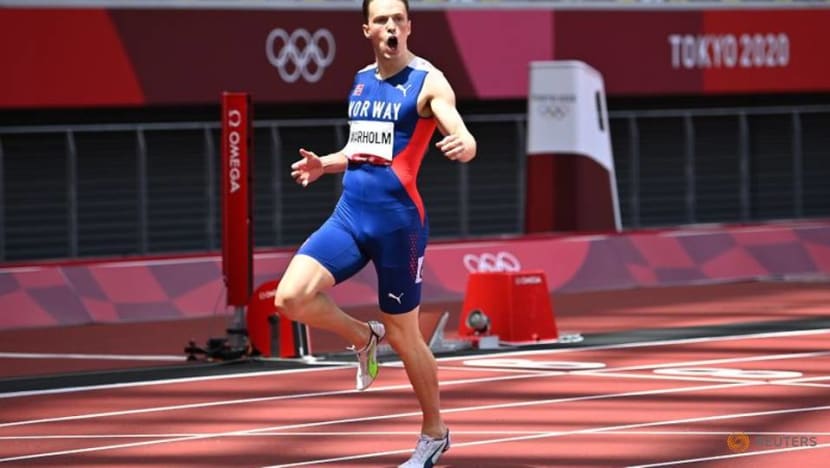 Olympics-Athletics-Warholm destroys world record to win 400m hurdles gold Olympics-Athletics-Warholm destroys world record to win 400m hurdles gold