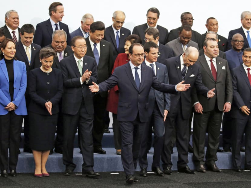 French President Francois Hollande (centre) posing with world leaders for a photo at the COP21, United Nations Climate Change Conference in Le Bourget, outside Paris, yesterday. Photo: AP