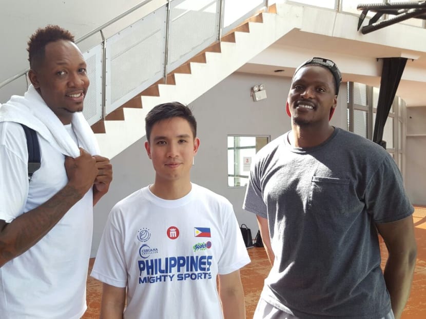Former NBA player Alford Thornton (right) with Mighty Sports head coach Charles Tiu (centre) and teammate Marcus Douthit. Thornton is on a mission to play well, and he hopes to be back in the United States and get another chance to be in the NBA. Photo: Adelene Wong