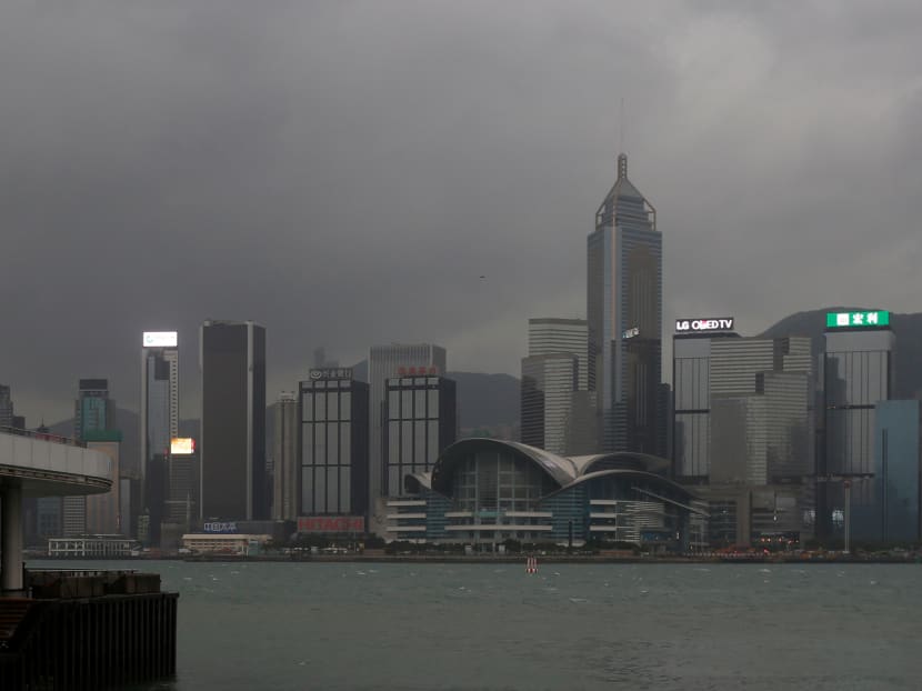 The Hong Kong skyline, as Typhoon Haima approaches the city. Photo: Reuters The Hong Kong skyline, as Typhoon Haima approaches the city. Photo: Reuters