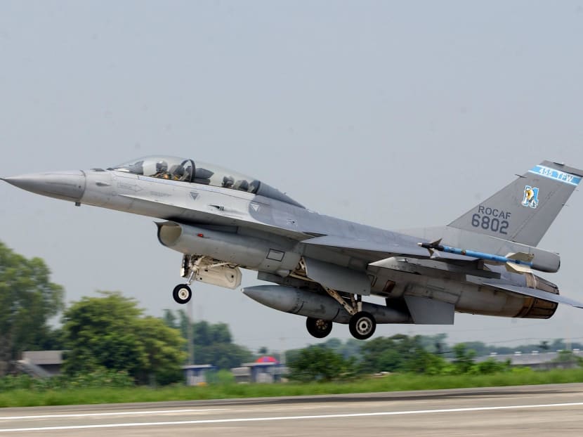 A US-made F16 fighter jet takes off at Chiayi Airforce Base in Taiwan during a demonstration for members of the media on Aug 19, 2003.