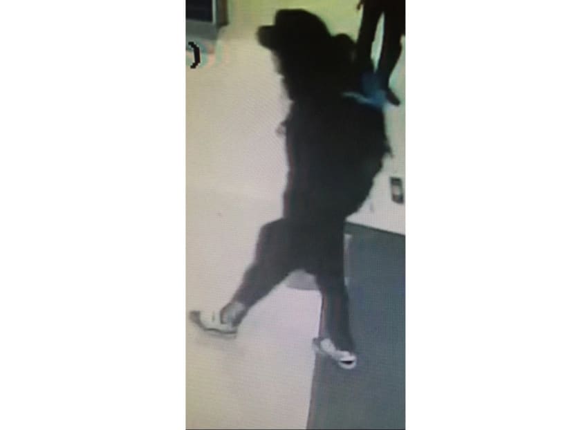 A security camera image of the suspect in a shopping mall on May 19 with a blue backpack. Photo: AP