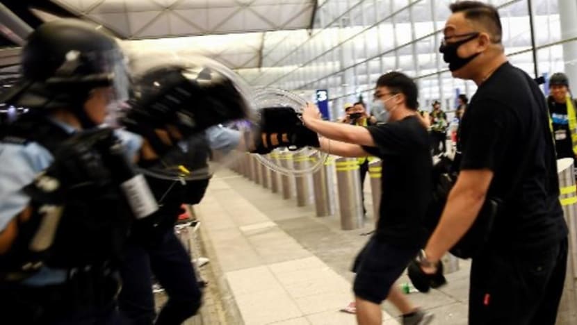 China slams 'terrorist-like actions' by protesters at Hong Kong airport