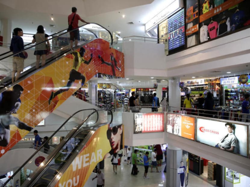 Shoppers at Queensway Shopping Centre. Shoppers at Queensway Shopping Centre.