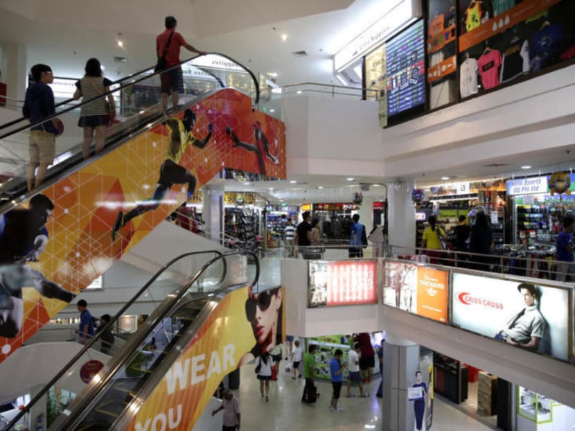 Shoppers at Queensway Shopping Centre.