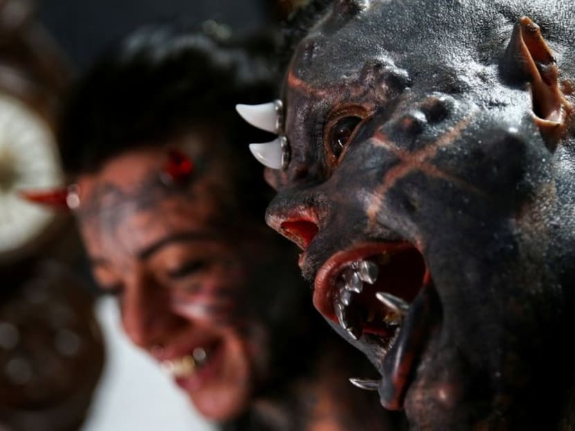 'The sinister attracted me': Brazilian tattoo artist morphs into devil look-alike 'The sinister attracted me': Brazilian tattoo artist morphs into devil look-alike