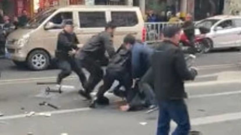 China hijacker killed two before commandeering bus China hijacker killed two before commandeering bus