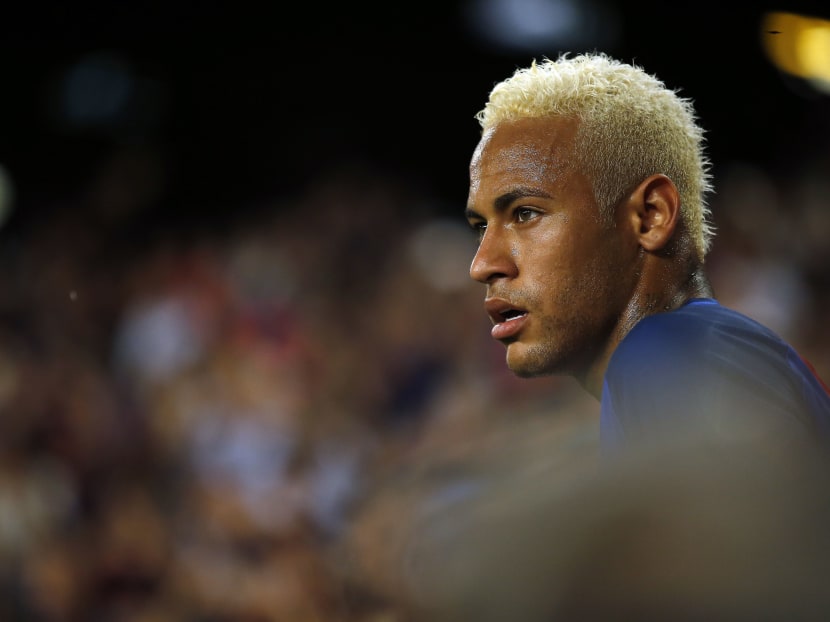 FC Barcelona's Neymar looks on during the Spanish La Liga soccer match between FC Barcelona and Alaves at the Camp Nou in Barcelona, Spain, Saturday, Sept. 10, 2016. Photo: AP