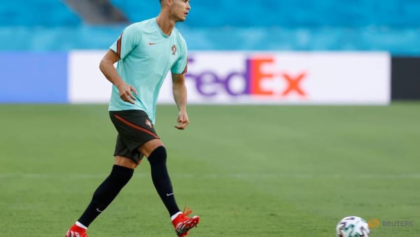Soccer-Belgium turn to Eden Hazard, Portugal make two changes
